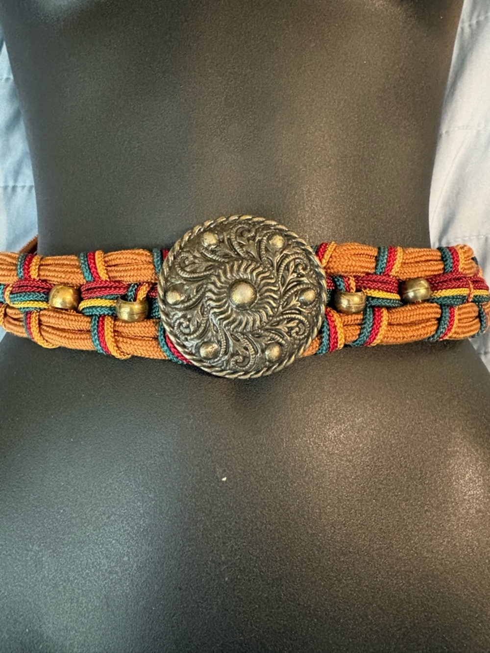 Vintage Orange Woven Belt with Embossed Silver-Gold Medallion